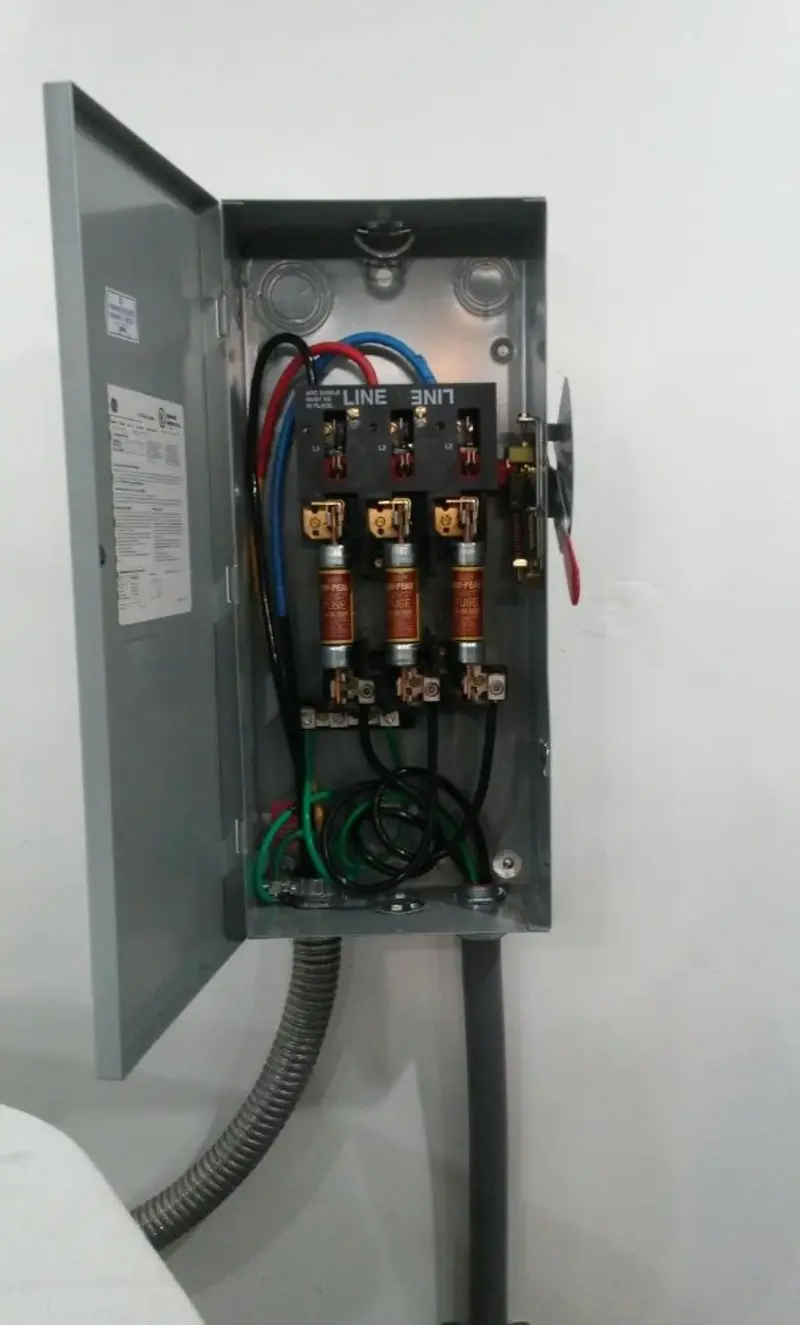 Three-phase disconnect switch installed for Smoke Detector Installation in Poinciana