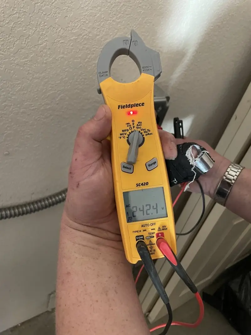 Voltage testing with clamp meter during Generator Installation in Poinciana